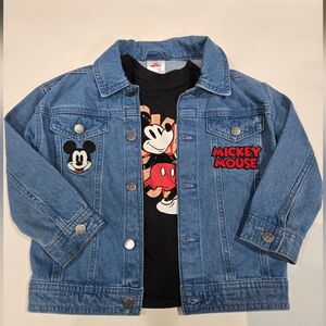 This is a Disney Mickey Mouse denim jacket and graphic t-shirt set.
